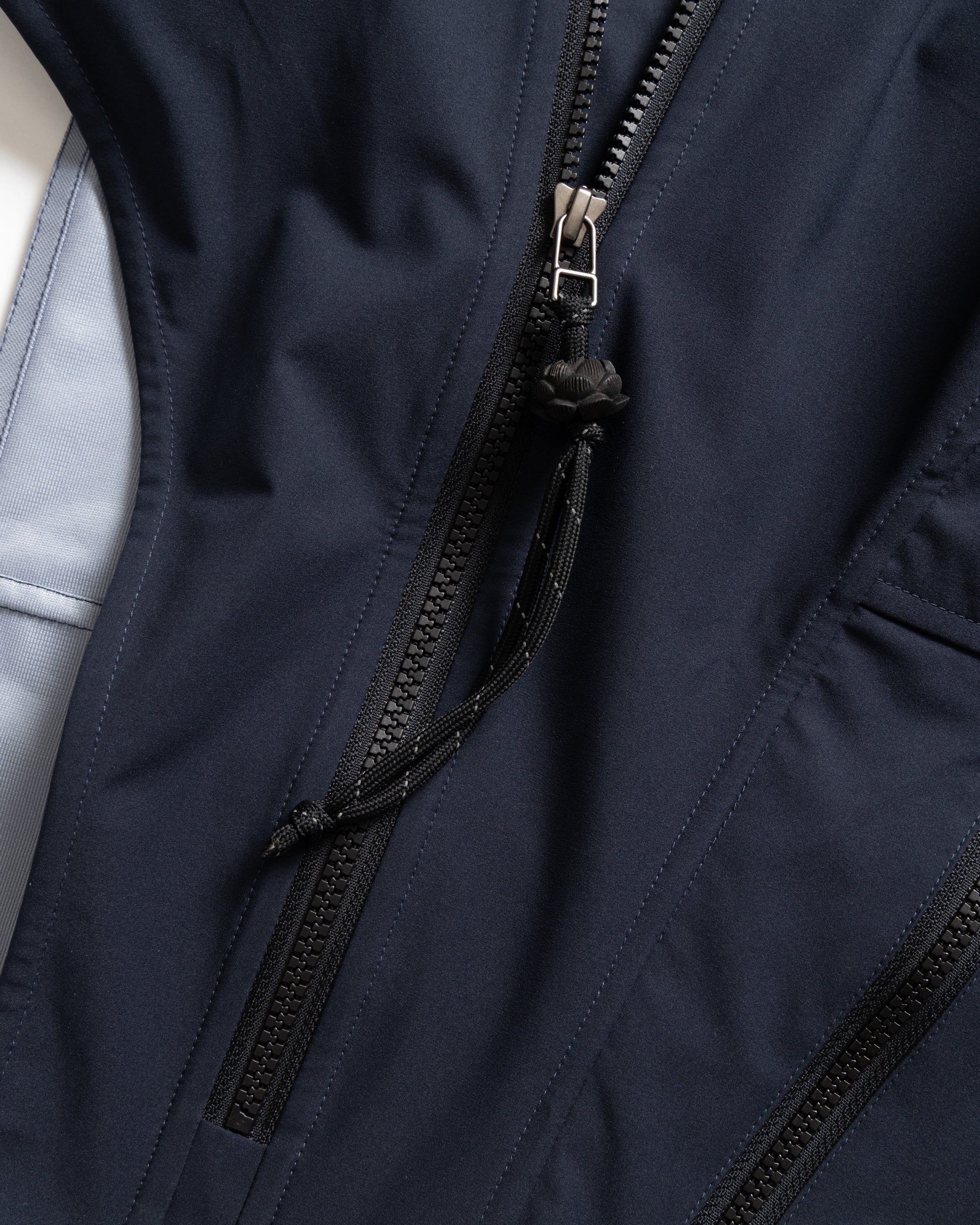 ASYMMETRICAL RAINSHADOW HOODED VEST - NOCTURN NAVY WATER-REPELLENT 3L BONDED MEMBRANE