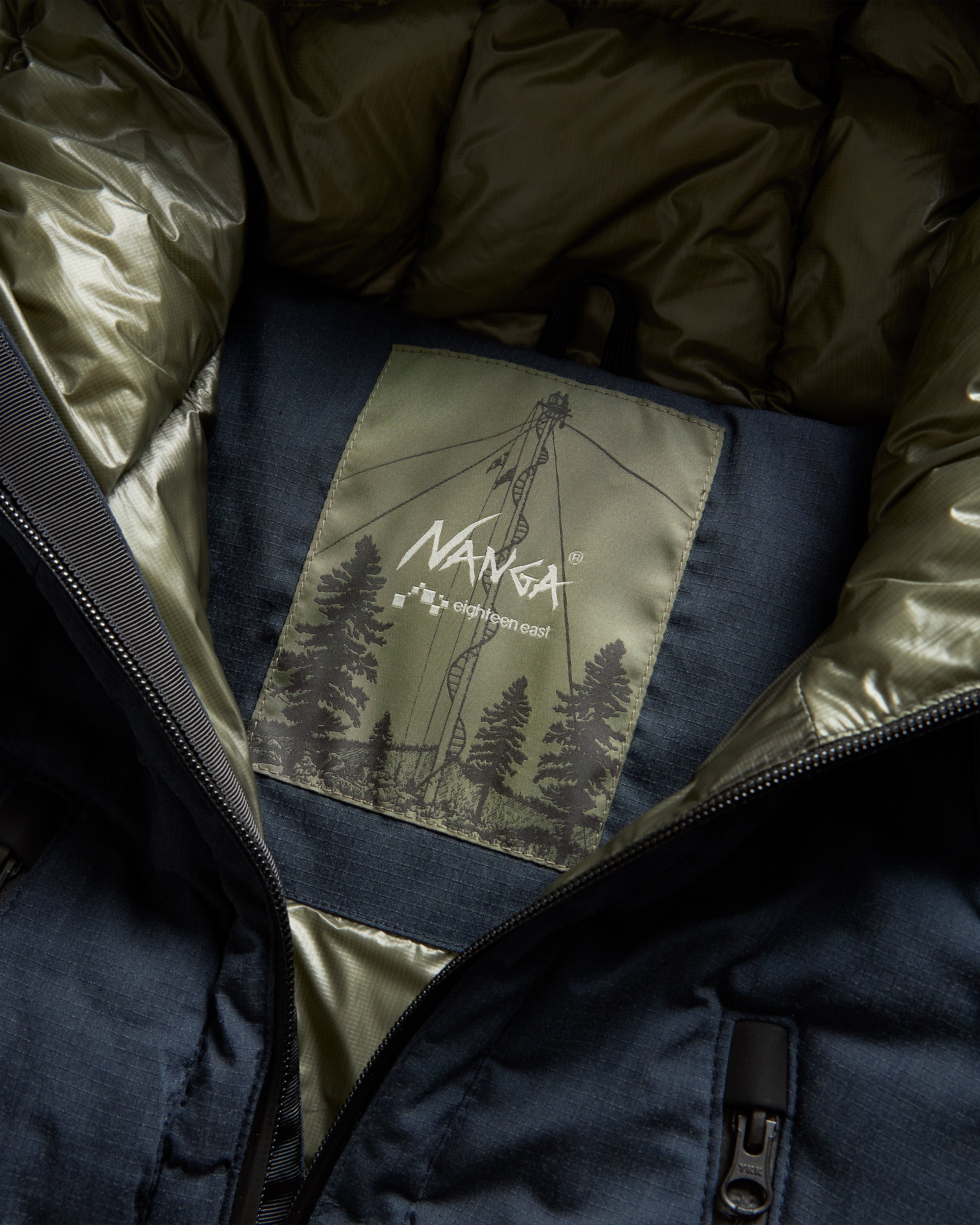 18 EAST / NANGA HOODED LOOKOUT DOWN JACKET - NAVY MELANGE HINOC / OD GREEN 15DN RIPSTOP NYLON