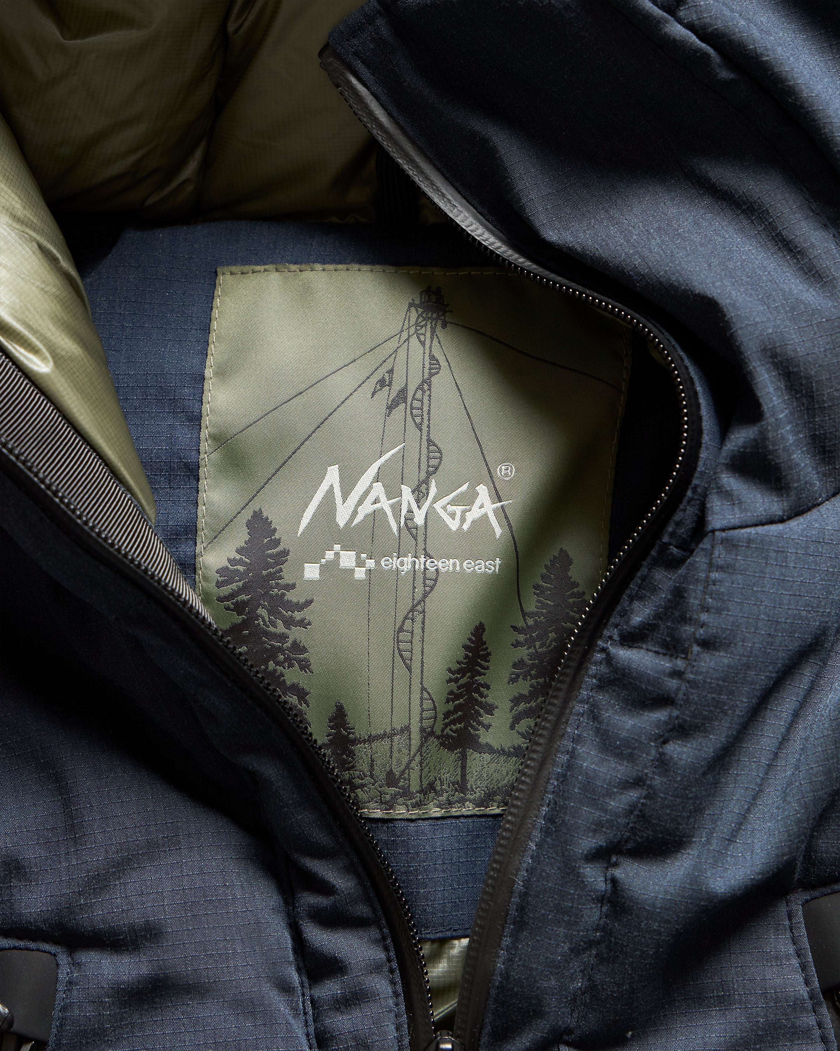 18 EAST / NANGA HOODED LOOKOUT DOWN JACKET - NAVY MELANGE HINOC / OD GREEN 15DN RIPSTOP NYLON