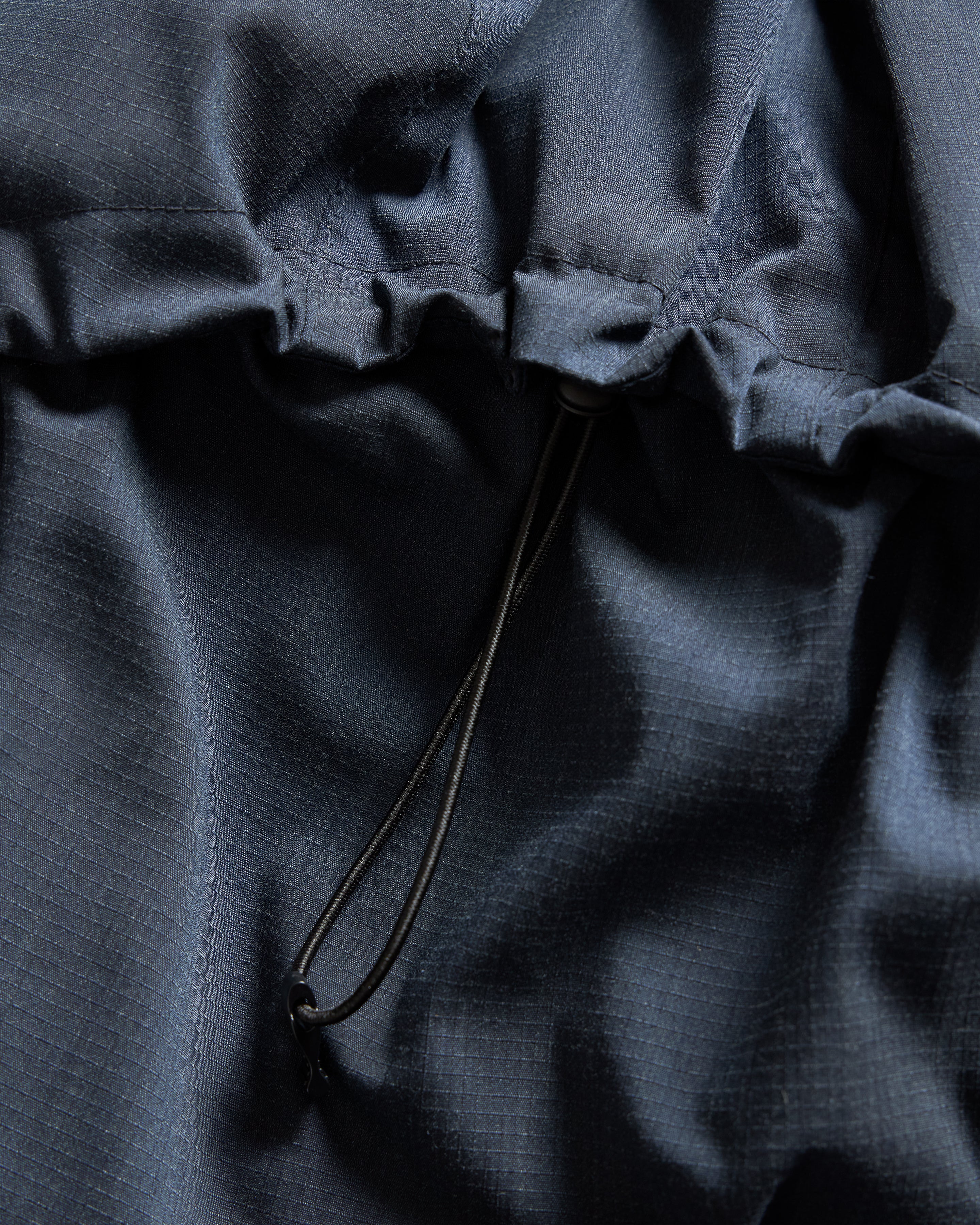 18 EAST / NANGA HOODED LOOKOUT DOWN JACKET - NAVY MELANGE HINOC / OD GREEN 15DN RIPSTOP NYLON