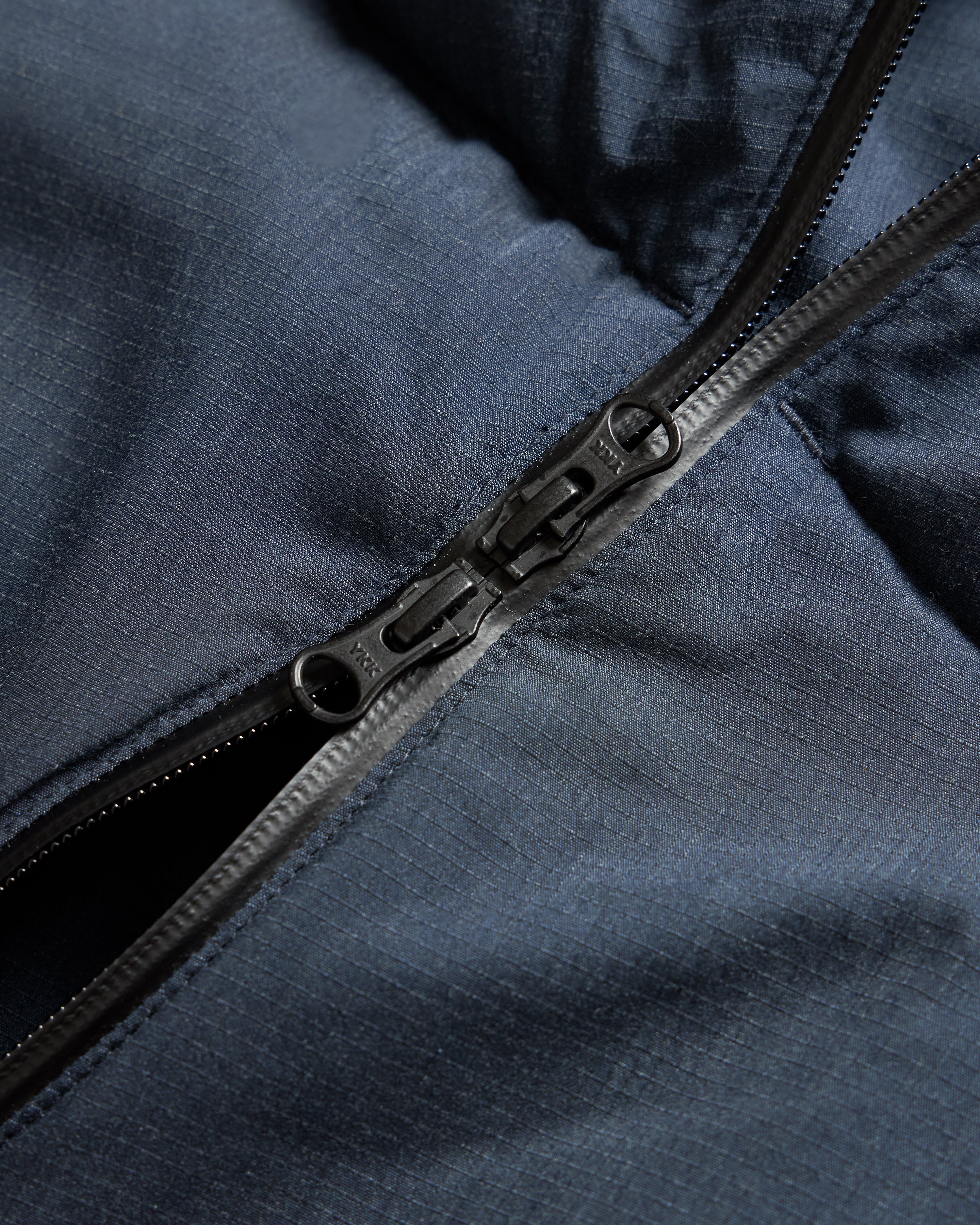 18 EAST / NANGA HOODED LOOKOUT DOWN JACKET - NAVY MELANGE HINOC / OD GREEN 15DN RIPSTOP NYLON