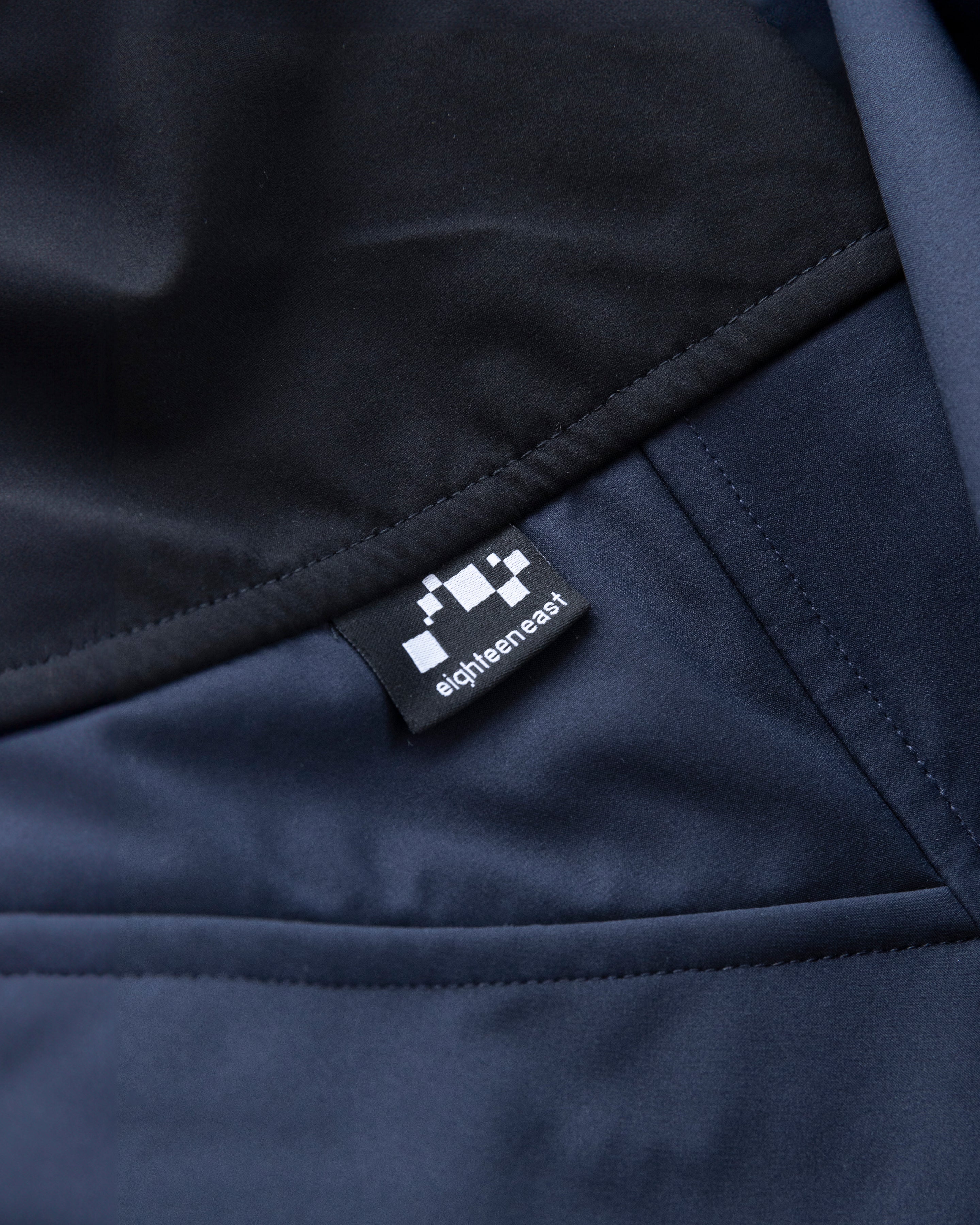 RAINSHADOW OUTDOOR PROTECTION SYSTEM HOODED SHELL - MIDNIGHT NAVY / BLACK WATER-REPELLENT BONDED MEMBRANE