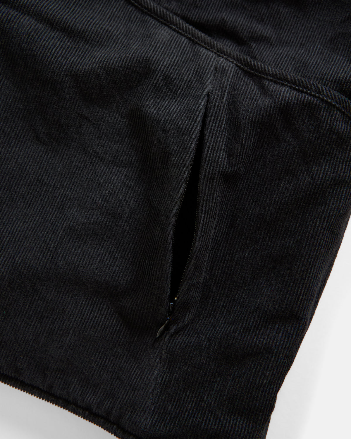 KEARSE REVERSIBLE UTILITY VEST - BARELY BLACKWATCH BEESWAX COATED COTTON TWILL AND BLACK COTTON CORDUROY