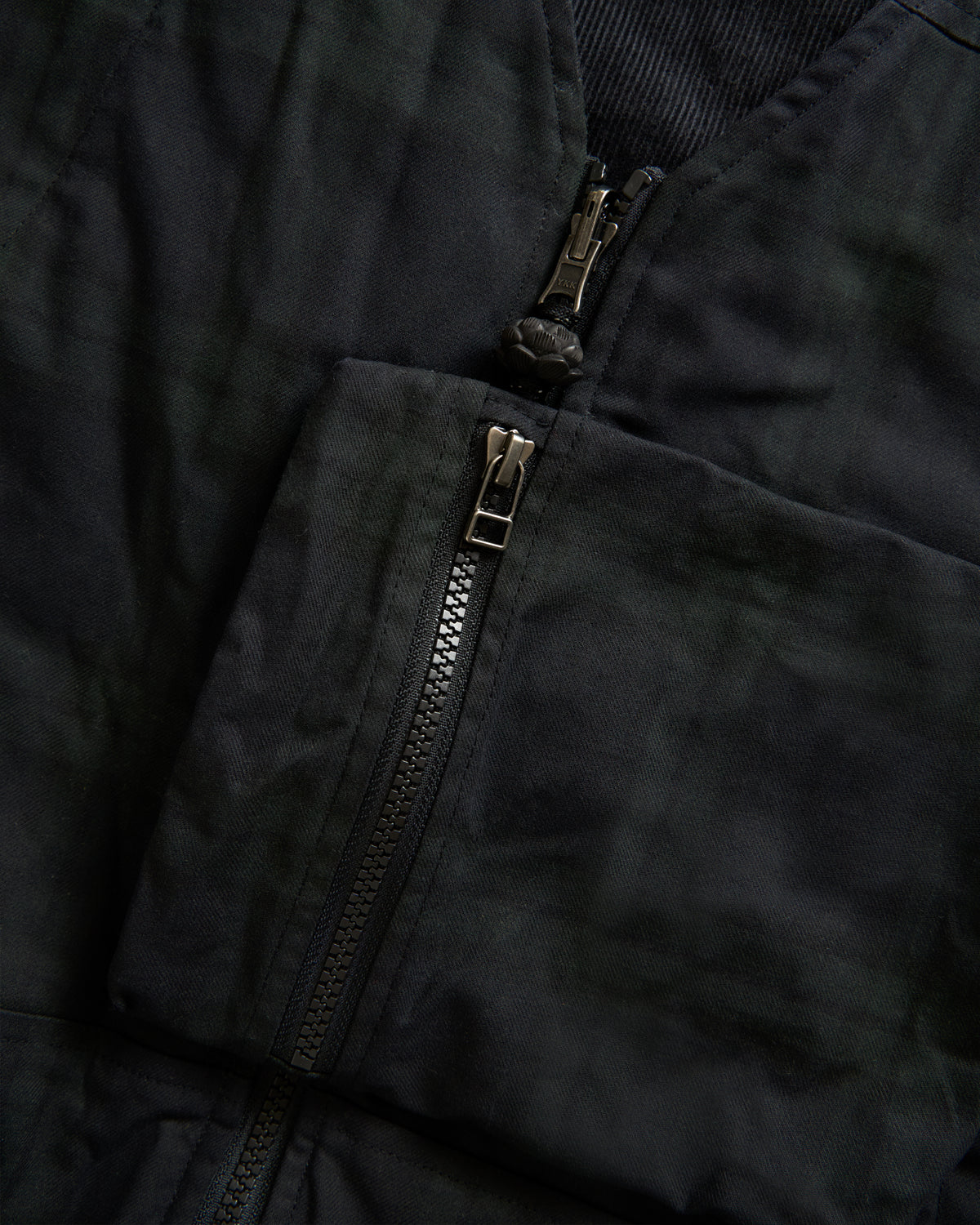 KEARSE REVERSIBLE UTILITY VEST - BARELY BLACKWATCH BEESWAX COATED COTTON TWILL AND BLACK COTTON CORDUROY