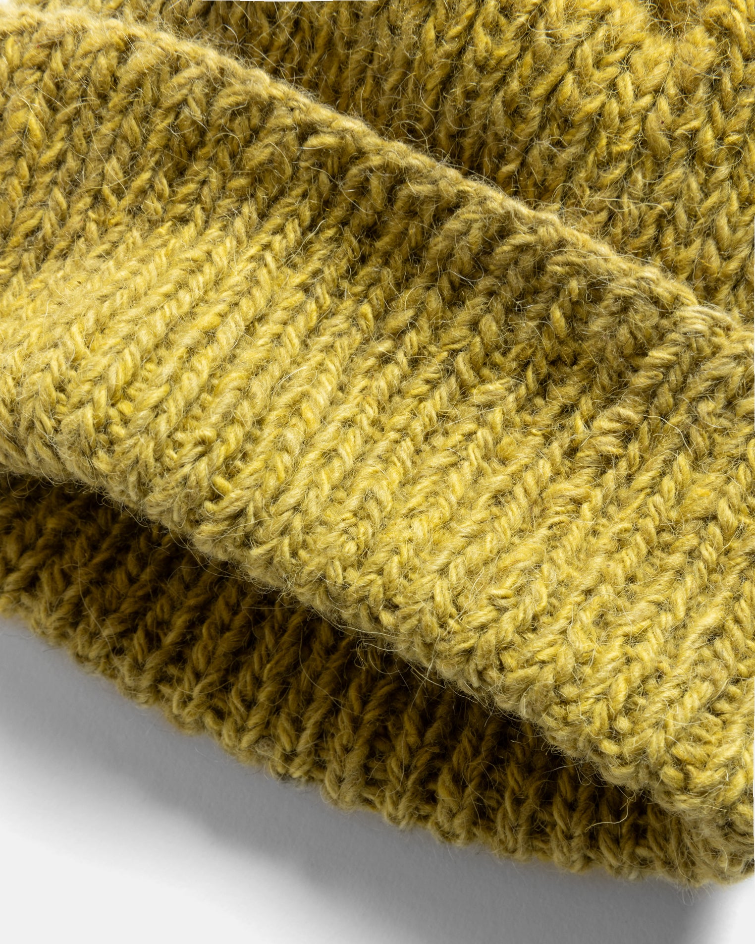 HIMALAYAN HAND-KNIT WATCH CAP - NATURALLY DYED MARIGOLD NOMADIC WOOLEN RIB