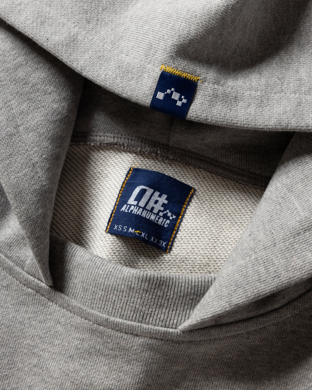 A# MOTO HOODED SWEATSHIRT - PRACTICE HEATHER HAND BLOCK PRINTED 19oz. ALL COTTON LOOPBACK TERRY FLEECE