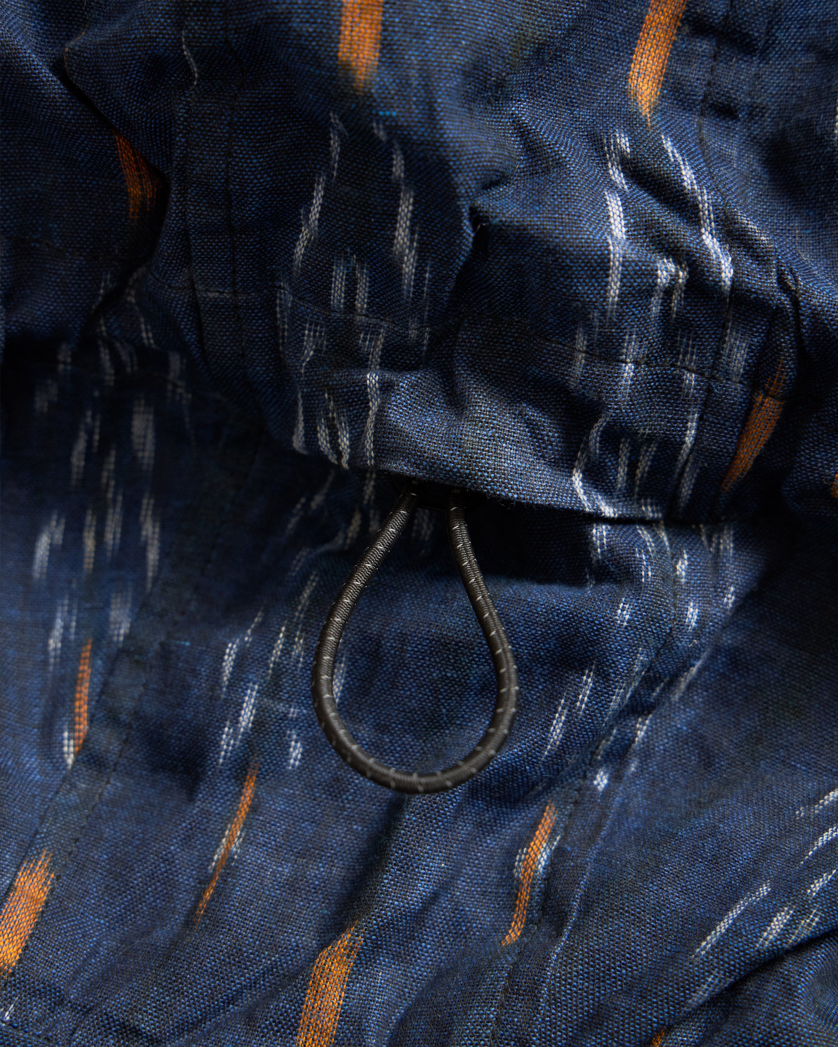 BANKS 2.0 UTILITY JACKET - MIDNIGHT / ECRU / ORANGE BEESWAX COATED HANDWOVEN COTTON IKAT
