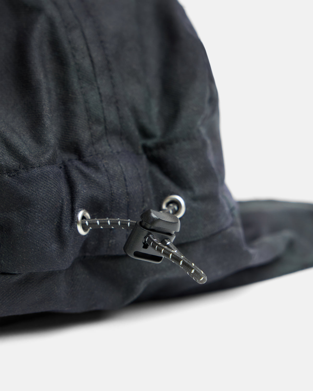 RAINIER TRAPPER HAT - BARELY BLACKWATCH BEESWAX COATED COTTON TWILL AND BLACK COTTON CORDUROY