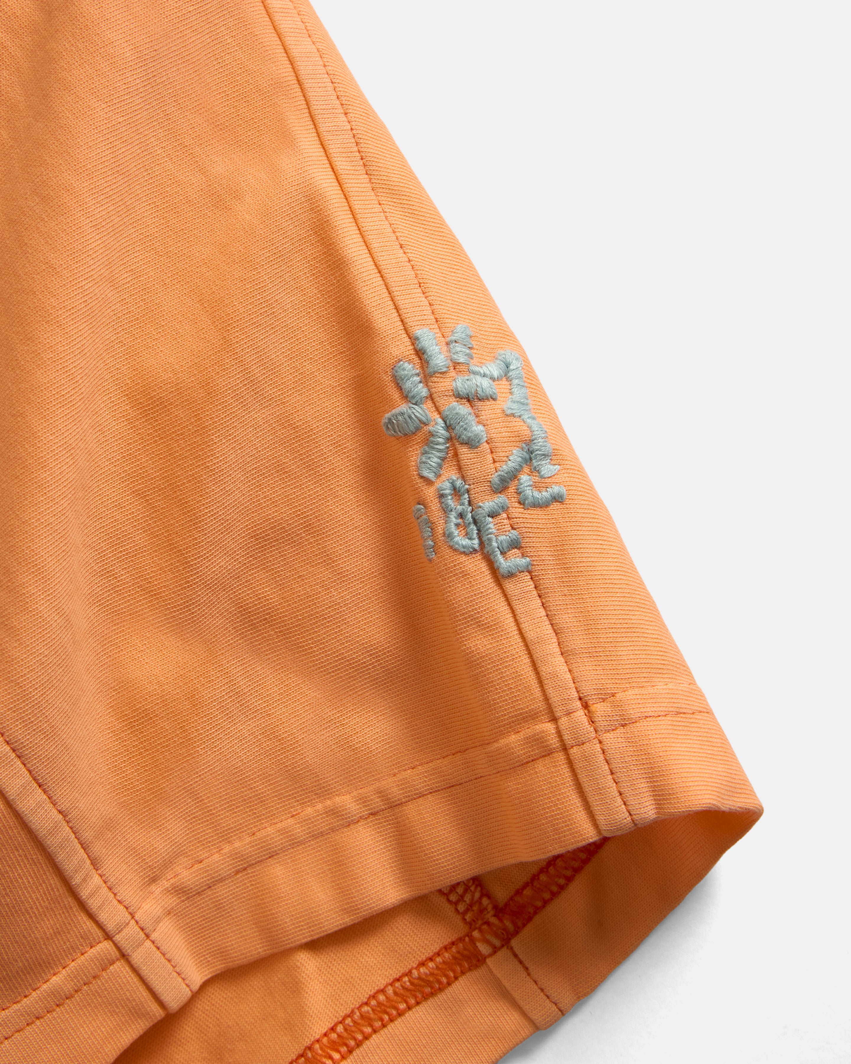 S/S SCRIMMAGE TEE - FADED TANGERINE PIGMENT DYED 7.75 oz. ALL SEASON COTTON JERSEY