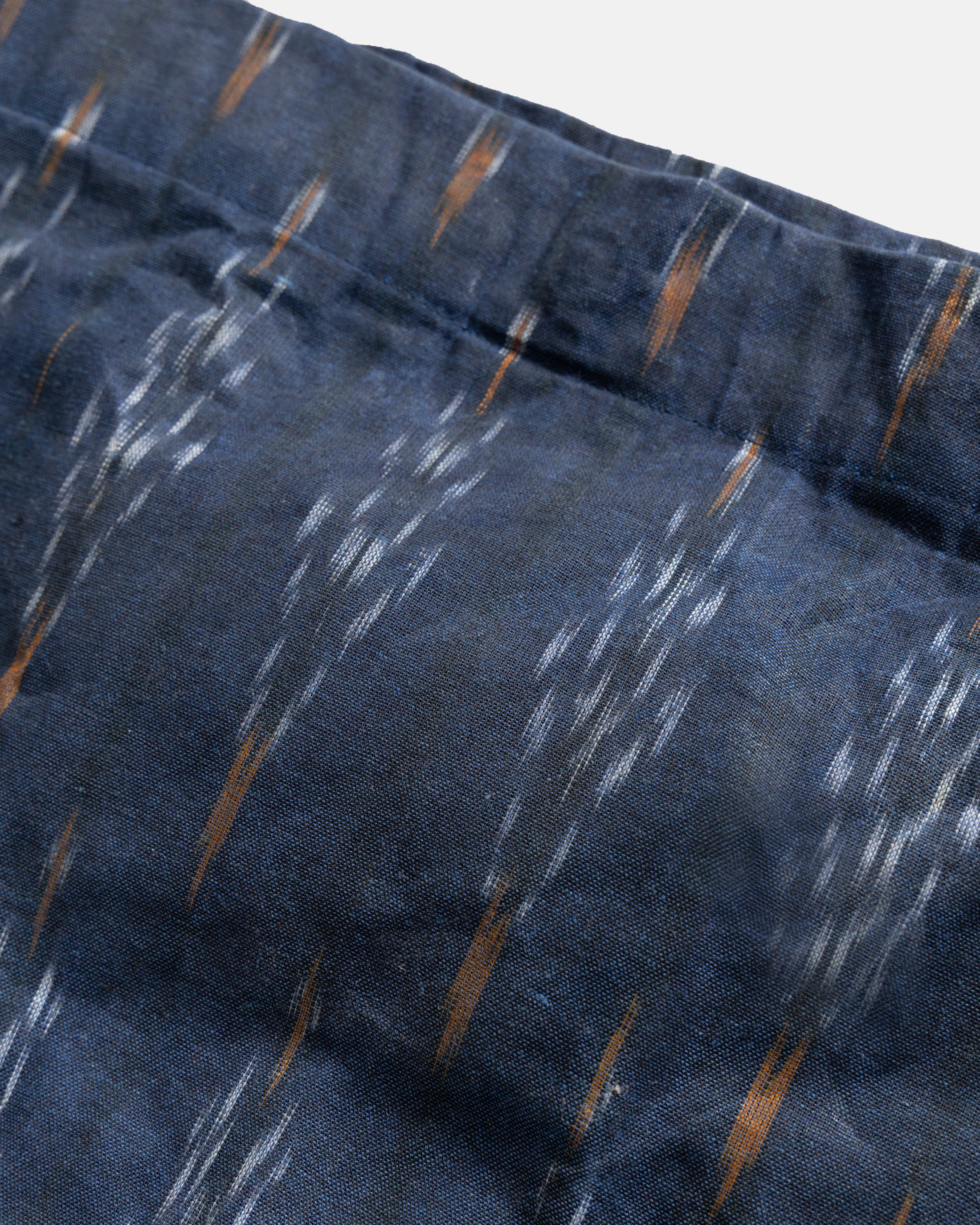 CONVERTIBLE CARRY-ALL SLING - MIDNIGHT / ECRU / ORANGE BEESWAX COATED HANDWOVEN COTTON IKAT