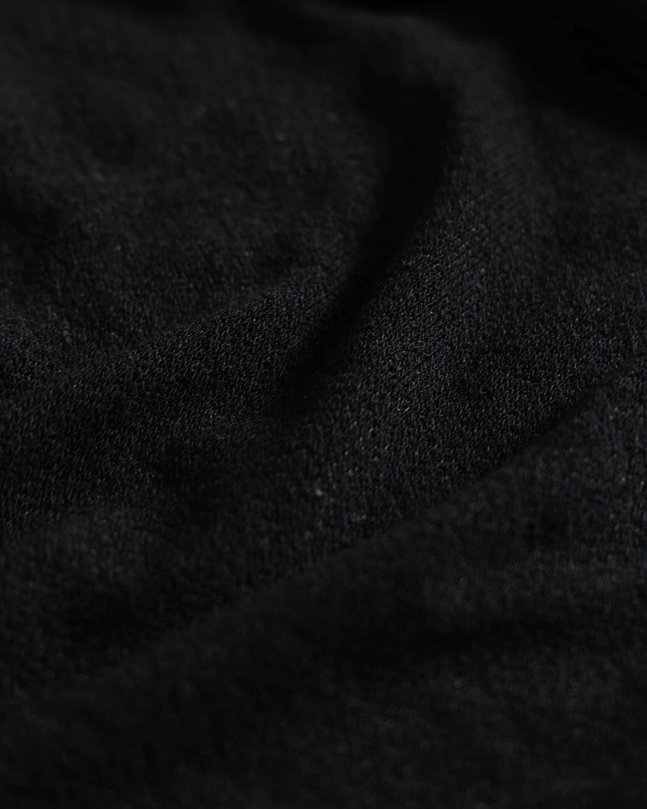 MULTIFACETED HIGHLY PRACTICAL VERY USEFUL TUBE - BLACK LYOCELL AND WOOL DOUBLE TWIST LOOSE KNIT JERSEY